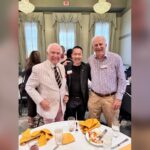 Di Tran at a Rotary Club of Louisville civic lunch with Louisville public-service figures Fred Cowan and Lacey Smith.